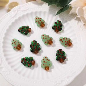 Handcrafted glass Christmas tree beads in green and red for DIY jewelry making and crafts