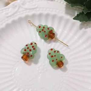 Handcrafted green glass Christmas tree beads with red dots for DIY jewelry making