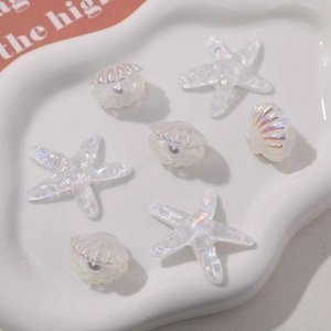 Iridescent ocean resin charms with starfish and shells for DIY shoe and phone case decor