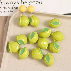 Detail of DIY lemon resin charms for handmade earrings and jewelry making accessories