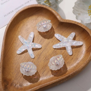 DIY iridescent resin charms set featuring 2 starfish and 3 pearl shells for craft