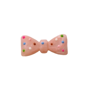 Nœud en résine rose marbrée à pois colorés avec trou central pour accessoires DIY