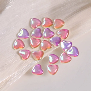 Chic iridescent heart charms with aurora holographic finish for DIY crafts and nail art