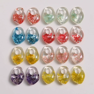 Transparent resin flower pendant in irregular shape for DIY necklace or earring jewelry