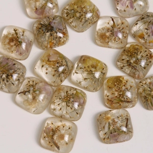 Handmade clear resin square charms with purple dried flowers and gold beads for DIY jewelry