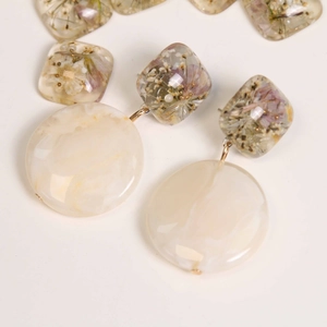 Handmade resin earrings with real dried flowers and marble texture round pendants