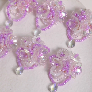 Handmade iridescent crystal flower beads in purple for DIY jewelry and hair accessories