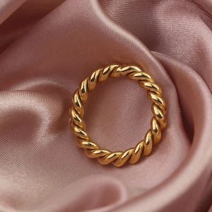 18k gold plated stainless steel twisted rope ring for men and women on pink silk