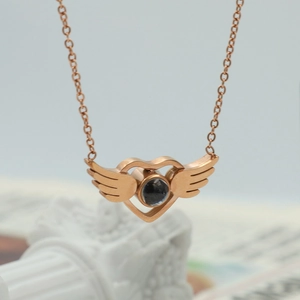 Rose gold angel wing heart necklace with 100 languages I love you projection stone