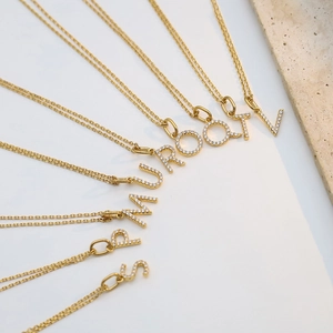 Custom gold stainless steel initial necklace with crystal pavé letter pendants
