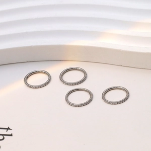 Lot de 4 anneaux clicker en acier chirurgical avec incrustation de zircone brillant
