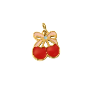 Detailed close-up of cherry pendant with red enamel and a colorful bow for DIY jewelry