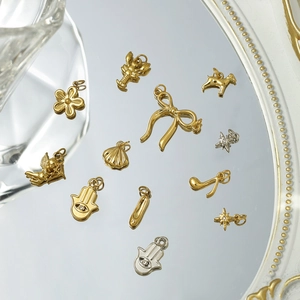 Assortimento di ciondoli in acciaio inossidabile oro e argento con motivi farfalla e animali