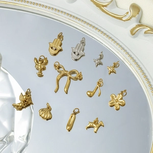 Varietà di ciondoli oro e argento inclusi farfalla e angelo per gioielli fai-da-te creativi