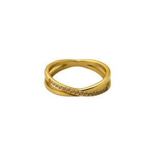 Polished double-layer crisscross gold ring with sparkling zircon inlay on white background