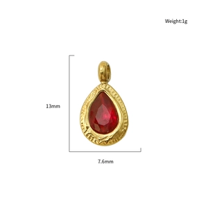 Gold-plated stainless steel teardrop pendant with red stone and textured finish