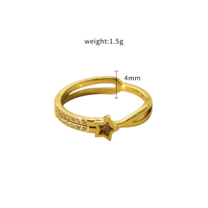 Detailed macro view of 4mm gold titanium star ring with embedded zircon stones