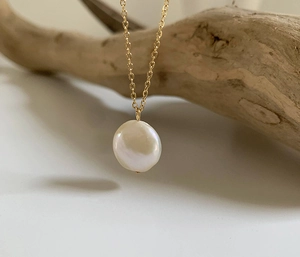 18K gold titanium steel necklace with a minimalist natural freshwater pearl pendant