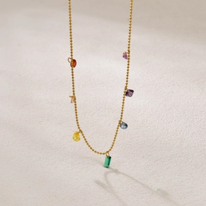 Rainbow gemstone pendant necklace in gold plated titanium steel with colorful zircon drops