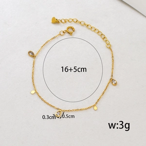 18K gold geometric bracelet featuring teardrop crystals and adjustable heart charm chain