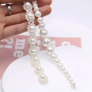 DIY long pearl shoe chains featuring gradient pearls and woven flower cluster designs