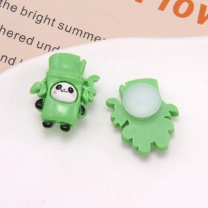 Detail view showing front and back of cute panda bamboo shoe charms for clogs