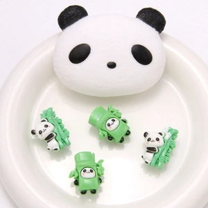 Macro shot of 5pcs cute cartoon panda resin charms for DIY shoe decoration kits