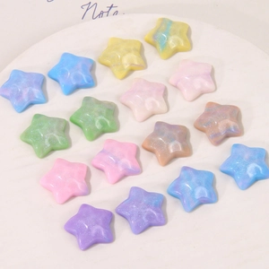 Star-shaped resin accessories with starry glitter and marble textures in macaron colors