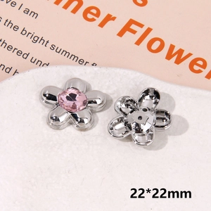 Detail of 22mm pink rhinestone silver flower charm for clog shoes and DIY accessories