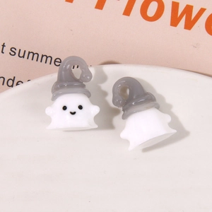 Macro view of cute resin ghost charms with grey hats for DIY earring and jewelry making