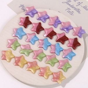 Gradient star-shaped resin charms with shimmering pearlescent marble finish for DIY crafts