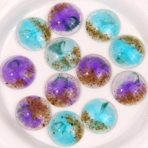 Round beach-style resin cabochons with purple and blue sand texture for DIY hair clips
