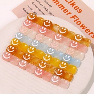 Translucent square smiley face resin beads in assorted candy colors for DIY jewelry making