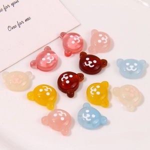 Detailed macro view of colorful cartoon resin bears for DIY crafts and jewelry making