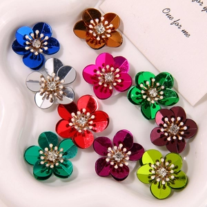 Colorful aurora coral sequin flower charms in heart dish for DIY crafts and accessories