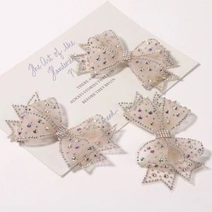 Set of three beige mesh bow hair accessories with colorful AB rhinestones and crystals