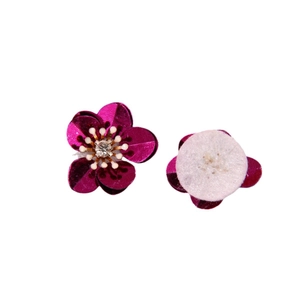 Magenta aurora floral sequins accessory with rhinestone center and white felt backing