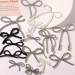 Handmade woven pearl bow charms with tassels for DIY shoe accessories and jewelry decor