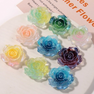 Detailed close-up of colorful resin roses with glitter for DIY hair accessories