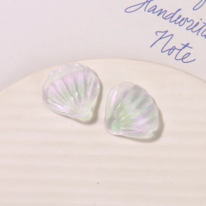 Macro detail of pearlescent iridescent shell charms with aurora finish for DIY crafts