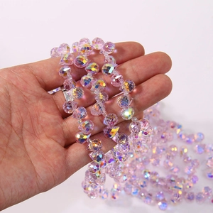 Close-up of pink AB faceted crystal glass teardrop beads for DIY jewelry making
