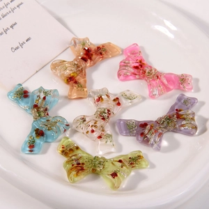 Resin bow accessories with dried flowers and pearls for DIY fairy hair ties and crafts
