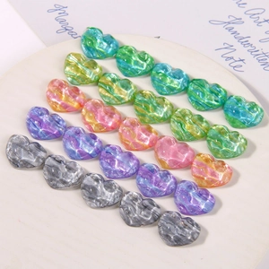 Water ripple glitter heart resin DIY accessories in six vibrant colors on ceramic plate