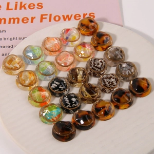 Artistic round resin charms with gold metal edges and tortoiseshell weaving patterns