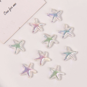 Detailed view of colorful iridescent starfish charms with laser glitters and resin texture