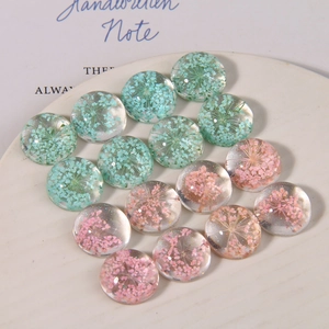 Handmade resin dried flower pendants in blue and pink for DIY jewelry accessories
