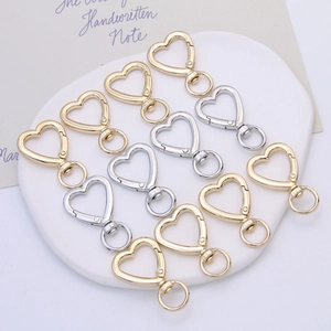 Zinc alloy heart-shaped metal keychains in gold and silver finish for DIY crafts