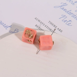 Pink square resin bead with steampunk gold gears for DIY jewelry making and earrings