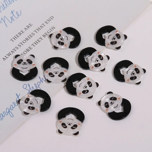 Detailed macro view of cute acrylic panda DIY pendant charms with pearl finish