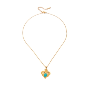 Dettaglio di una collana vintage dorata con pendente in turchese blu e chiusura a moschettone